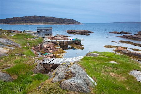 Wooden footbridge along ocean Photographie de stock - Premium Libres de Droits, Code: 6113-07242273