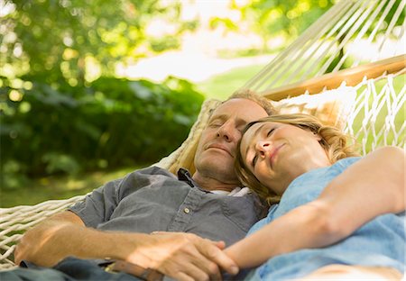 sleeping romance pic - Couple sleeping in hammock Stock Photo - Premium Royalty-Free, Code: 6113-07242361