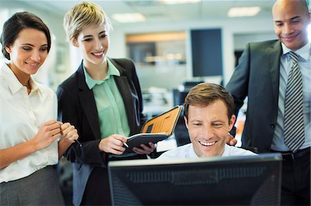 simsearch:649-06716753,k - Business people working at computer in office Stock Photo - Premium Royalty-Free, Code: 6113-07242678