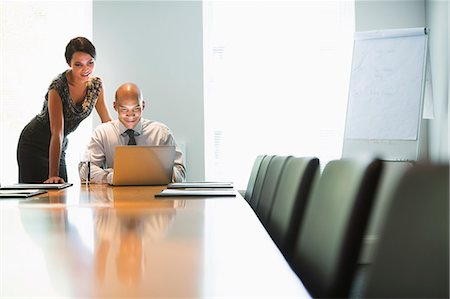 smiling computer office copy space - Business people working at laptop in conference room Stock Photo - Premium Royalty-Free, Code: 6113-07242703