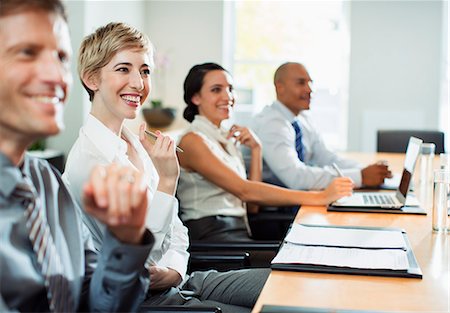 simsearch:6113-07242205,k - Business people sitting in meeting Stock Photo - Premium Royalty-Free, Code: 6113-07242713