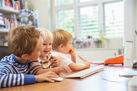 Children using home office together Stock Photo - Premium Royalty-Free, Code: 6113-07242813