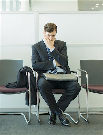 recruit - Businessman sitting in waiting area Stock Photo - Premium Royalty-Free, Code: 6113-07243164