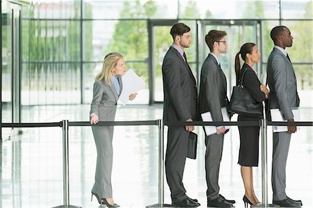 standing line up people side - Business people waiting in line Stock Photo - Premium Royalty-Free, Code: 6113-07243104