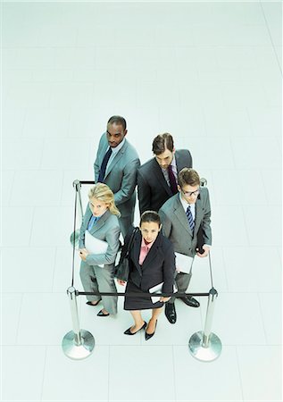 simsearch:6113-07243233,k - Business people standing in roped-off square Fotografie stock - Premium Royalty-Free, Codice: 6113-07243262