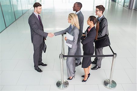 simsearch:649-03447554,k - Business people shaking hands Stock Photo - Premium Royalty-Free, Code: 6113-07243266