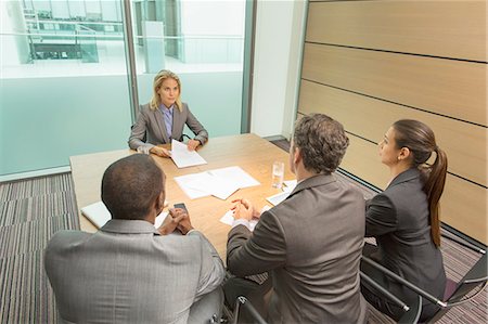 simsearch:6113-07243263,k - Business people talking in meeting Stock Photo - Premium Royalty-Free, Code: 6113-07243204