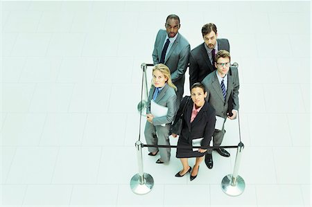 problem - Business people standing in roped-off square Stock Photo - Premium Royalty-Free, Code: 6113-07243227