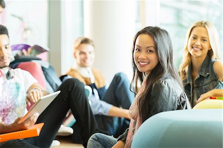 University students smiling in lounge Stock Photo - Premium Royalty-Free, Code: 6113-07243350