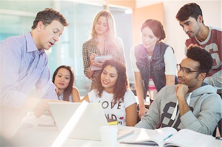 student and professor - Professor talking to students in classroom Stock Photo - Premium Royalty-Free, Code: 6113-07243400