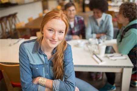 enjoying - Woman sitting with friends in cafe Stock Photo - Premium Royalty-Free, Code: 6113-07542490