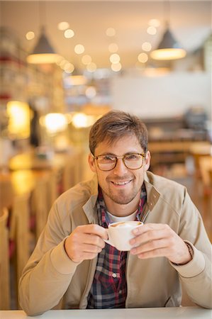 stubble - Man drinking coffee in cafe Stock Photo - Premium Royalty-Free, Code: 6113-07542420