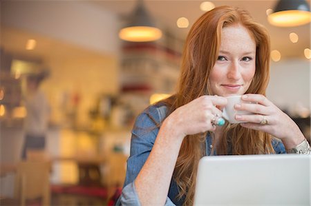 enjoy food life - Woman using laptop in cafe Stock Photo - Premium Royalty-Free, Code: 6113-07542540