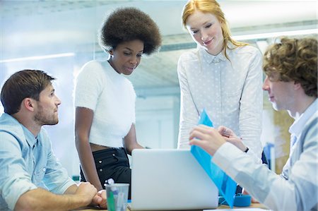 Business people talking in meeting Stock Photo - Premium Royalty-Free, Code: 6113-07542553