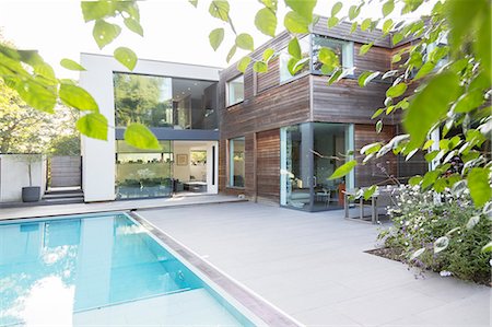 swimming pool nobody outdoor day - Modern house with swimming pool Stock Photo - Premium Royalty-Free, Code: 6113-07542674