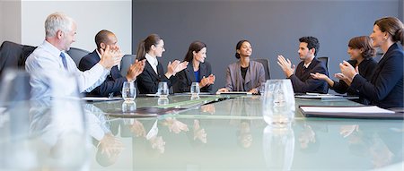 Business people applauding colleague in meeting Foto de stock - Sin royalties Premium, Código: 6113-07542626