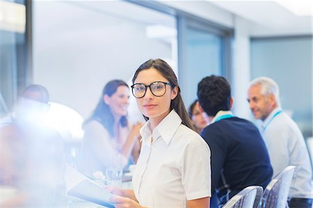 partner (activity) - Businesswoman smiling in meeting Stock Photo - Premium Royalty-Free, Code: 6113-07542628