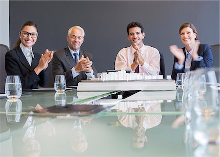 portrait model men picture - Business people applauding in meeting Stock Photo - Premium Royalty-Free, Code: 6113-07542637