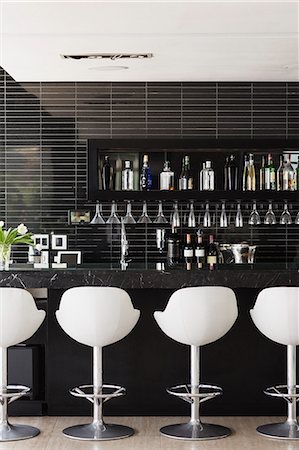 Empty stools at bar Stock Photo - Premium Royalty-Free, Code: 6113-07542703