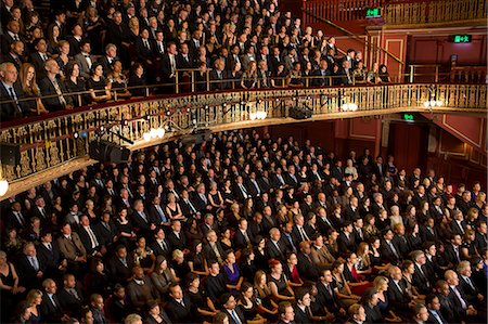 publicidad - Audience watching performance in theater Foto de stock - Sin royalties Premium, Código: 6113-07542947