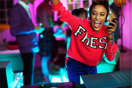 disc jockey - Woman playing music at party Stock Photo - Premium Royalty-Free, Code: 6113-07543075
