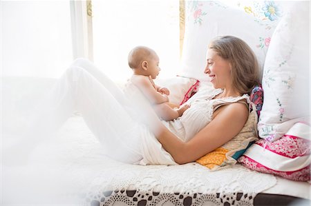 Mother playing with baby boy Stock Photo - Premium Royalty-Free, Code: 6113-07543198