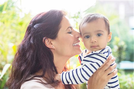 portrait natural woman - Mother holding baby girl Stock Photo - Premium Royalty-Free, Code: 6113-07543258