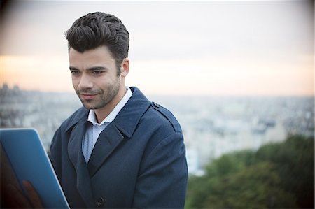 Businessman using digital tablet outdoors Stockbilder - Premium RF Lizenzfrei, Bildnummer: 6113-07543454