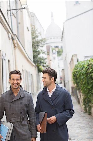 simsearch:6113-07543488,k - Businessmen walking on street near Sacre Coeur Basilica, Paris, France Stock Photo - Premium Royalty-Free, Code: 6113-07543474