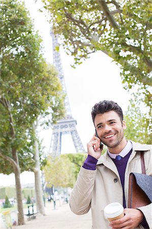 simsearch:6113-07543488,k - Businessman talking on cell phone near Eiffel Tower, Paris, France Stock Photo - Premium Royalty-Free, Code: 6113-07543438