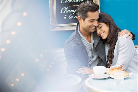 espresso - Couple hugging at sidewalk cafe in Paris, France Stock Photo - Premium Royalty-Free, Code: 6113-07543638