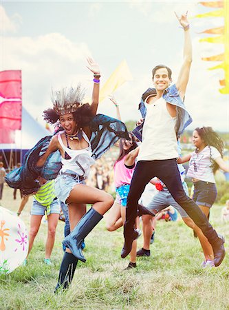 festival not monochrome and people not illustration not monochrome - Enthusiastic friends dancing at music festival Stock Photo - Premium Royalty-Free, Code: 6113-07564784