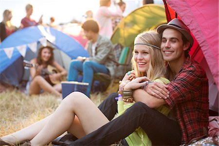 fair (exhibitions and performance events) - Couple hugging outside tent at music festival Stock Photo - Premium Royalty-Free, Code: 6113-07564738