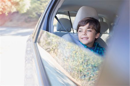 freedom child - Happy boy looking out car window Stock Photo - Premium Royalty-Free, Code: 6113-07564971