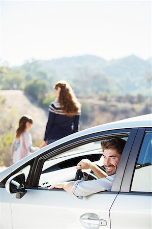 family outside ethnic - Portrait of happy man inside of car Stock Photo - Premium Royalty-Free, Code: 6113-07564974