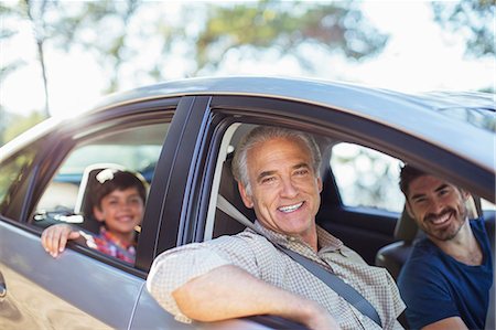 sunshine kid car - Portrait of multi-generation men inside car Stock Photo - Premium Royalty-Free, Code: 6113-07565093