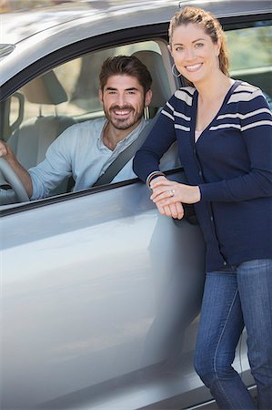 simsearch:6113-07565080,k - Portrait of happy couple inside and outside car Stock Photo - Premium Royalty-Free, Code: 6113-07565142