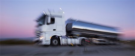 simsearch:6113-07565383,k - Stainless steel milk tanker on the road at night Stock Photo - Premium Royalty-Free, Code: 6113-07565448