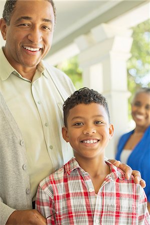 Close up portrait of grandfather and grandson Photographie de stock - Premium Libres de Droits, Code: 6113-07565586