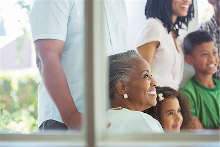 father daughter hispanic - Happy multi-generation family on porch Stock Photo - Premium Royalty-Free, Code: 6113-07565532