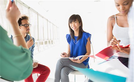 diversity meeting - Creative business people meeting in circle of chairs Stock Photo - Premium Royalty-Free, Code: 6113-07565864