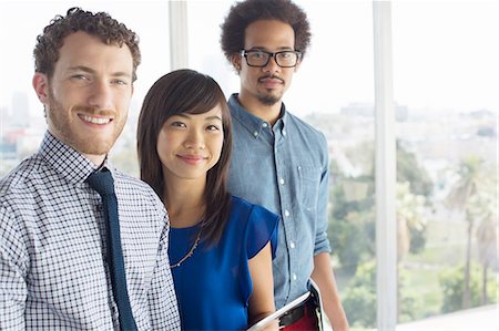 people office standing working - Portrait of confident business people Stock Photo - Premium Royalty-Free, Code: 6113-07565955