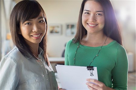 portrait two colleagues - Close up portrait of smiling businesswoman Stock Photo - Premium Royalty-Free, Code: 6113-07565934