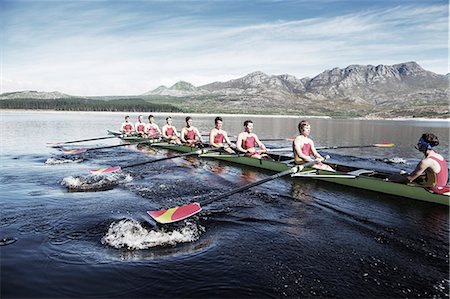 Rowing team rowing scull on lake Photographie de stock - Premium Libres de Droits, Code: 6113-07588787