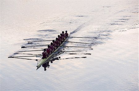 sports rowing - Rowing team rowing scull on lake Stock Photo - Premium Royalty-Free, Code: 6113-07588713