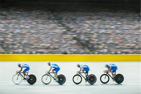 Track cycling team riding in velodrome Foto de stock - Sin royalties Premium, Código: 6113-07588720