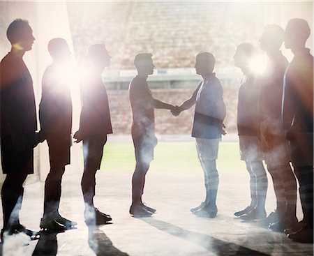 sports - Silhouette of soccer teams shaking hands Stock Photo - Premium Royalty-Free, Code: 6113-07588858