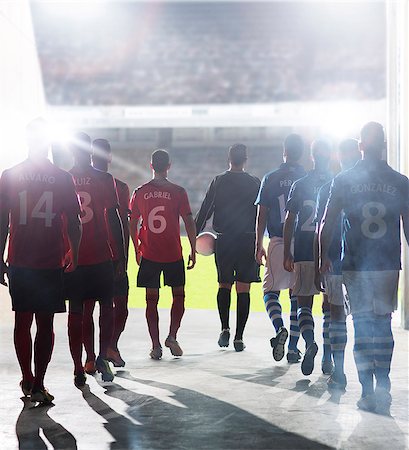 stadium night - Silhouette of soccer players walking to field Photographie de stock - Premium Libres de Droits, Code: 6113-07588862