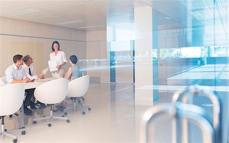 people at work conference room windows - Business people meeting in conference room Stock Photo - Premium Royalty-Free, Code: 6113-07588968