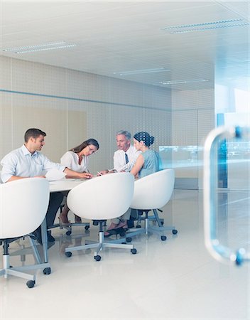 people at work conference room windows - Business people meeting at conference room table Stock Photo - Premium Royalty-Free, Code: 6113-07588981